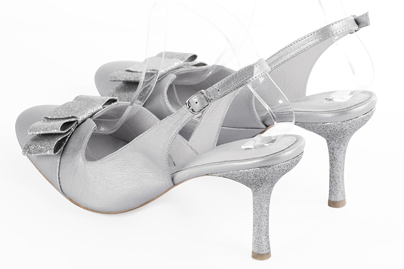 Light silver women's open back shoes, with a knot. Round toe. High slim heel. Rear view - Florence KOOIJMAN